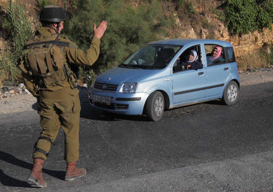 Isra?l arrête 80 Palestiniens en réponse à un enlèvement d'adolescents