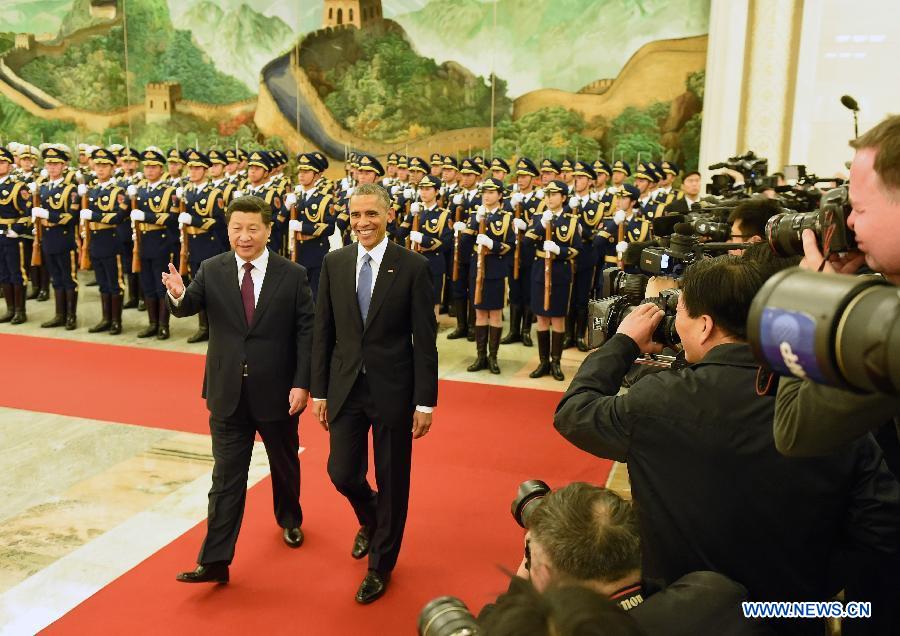 Xi Jinping s'entretient avec Barack Obama à Beijing