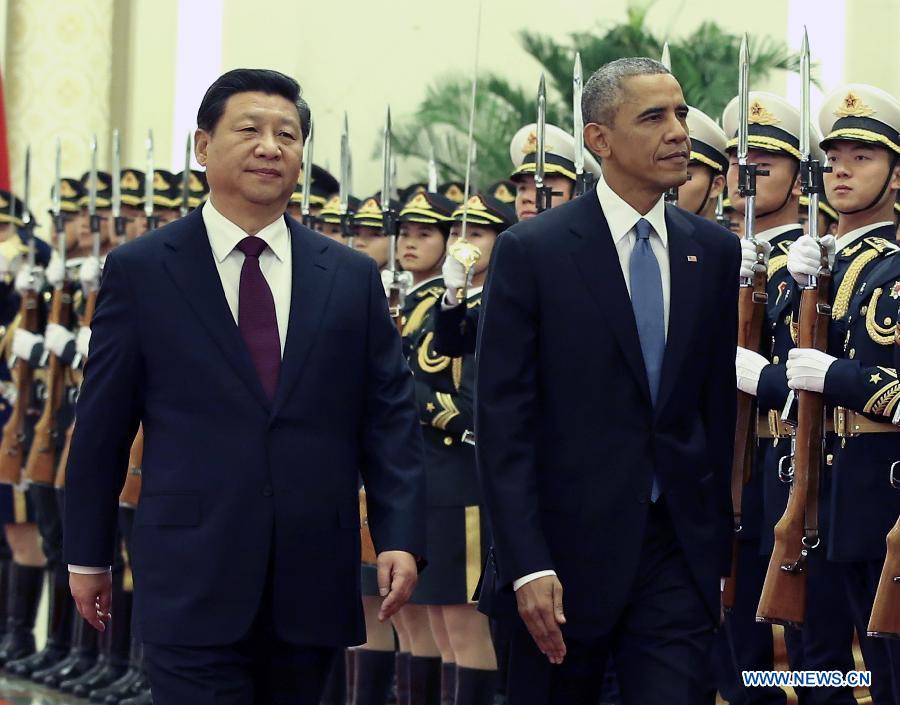 Xi Jinping s'entretient avec Barack Obama à Beijing