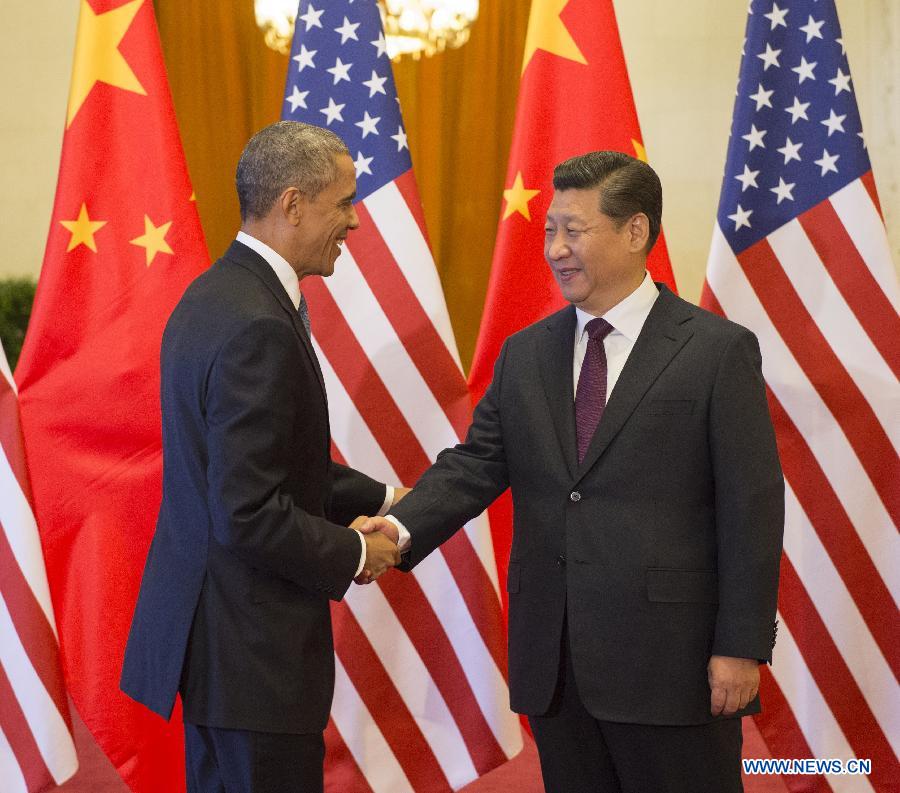 Xi Jinping s'entretient avec Barack Obama à Beijing