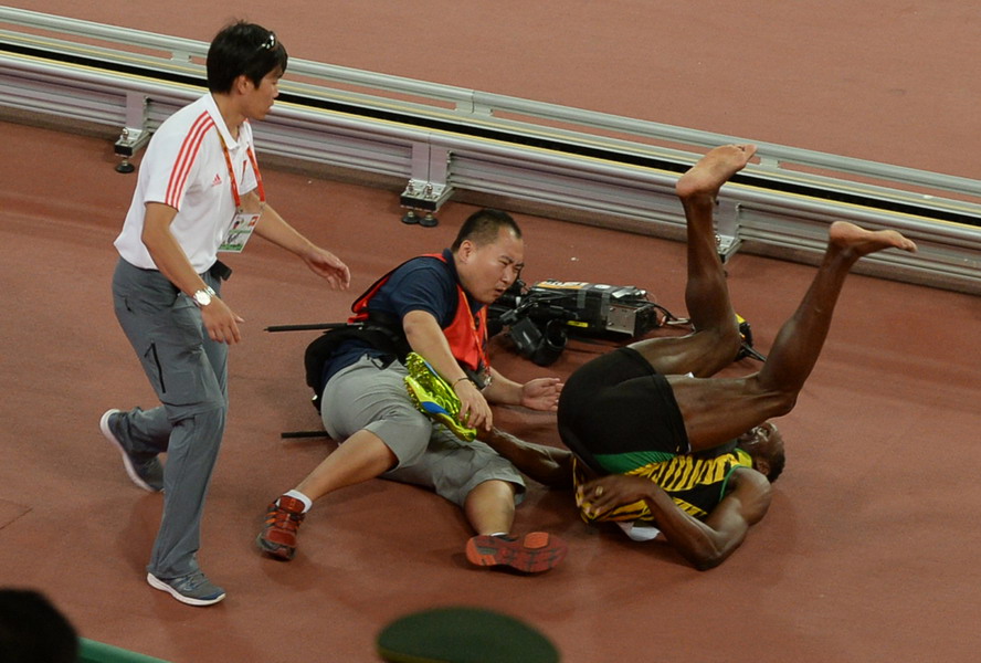 Le cameraman chinois qui a renversé Usain Bolt s’excuse en lui faisant un cadeau