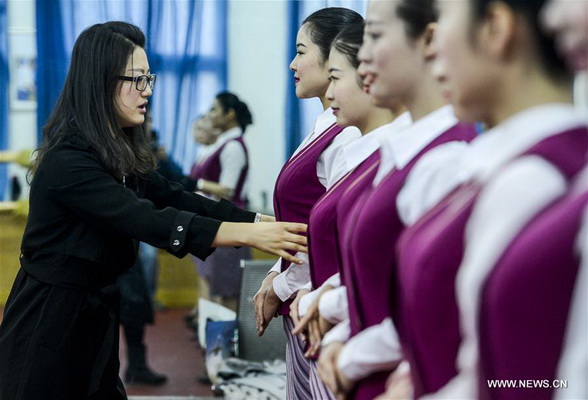 Xinjiang: Etre une h?tesse de l'air pour réaliser un rêve de voler