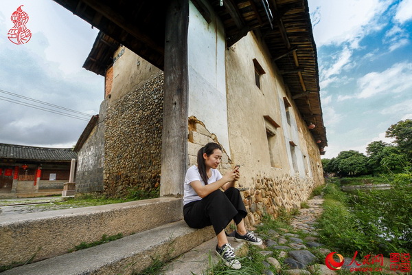 A la découverte du plus grand Tulou du monde