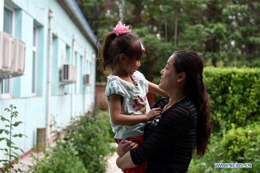 Ruban rouge dans le Shanxi?: de jeunes élèves porteurs du VIH 