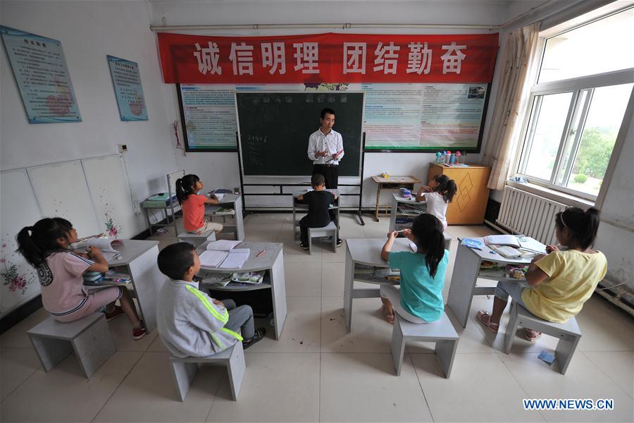 Ruban rouge dans le Shanxi?: de jeunes élèves porteurs du VIH 