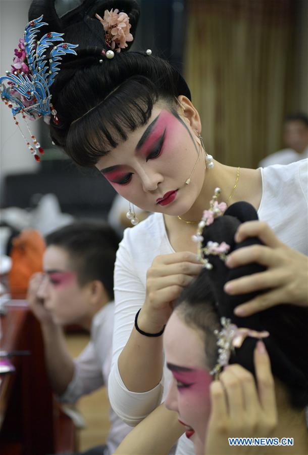 Chine : l'opéra des fleurs et tambours