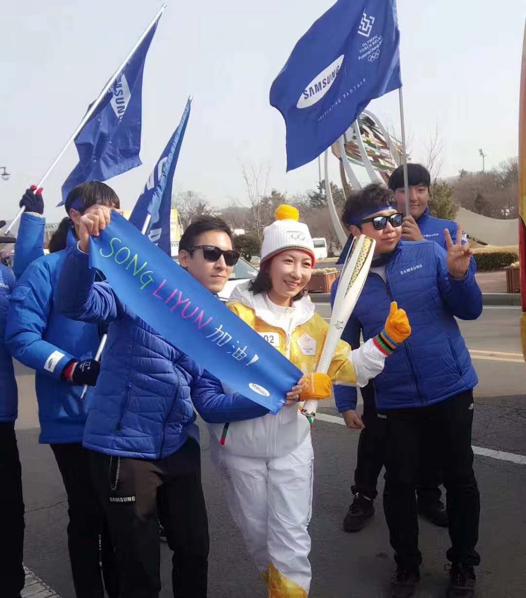 Le Quotidien du Peuple en ligne participe au relais de la flamme olympique des JO d'hiver de Pyeongchang