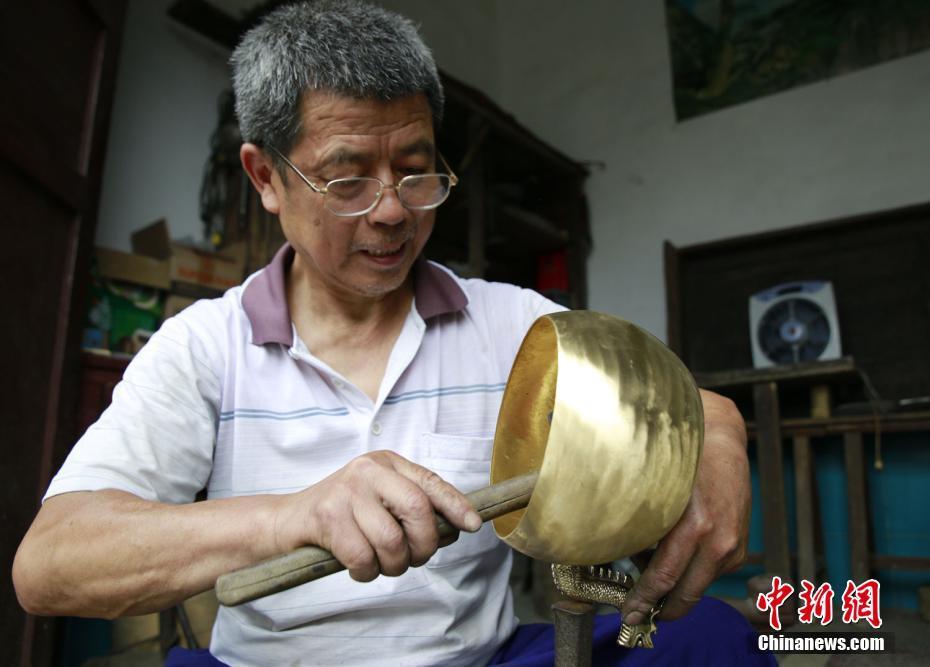 Dans le Hunan, les mille coups de marteau d'un chaudronnier