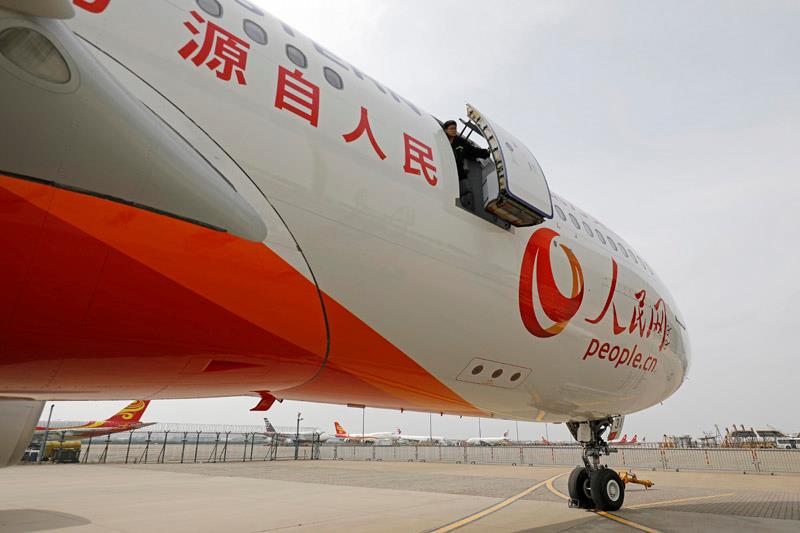 Premier vol réussi pour l'avion ? Le Quoditien du peuple en ligne ? entre Shanghai et Beijing