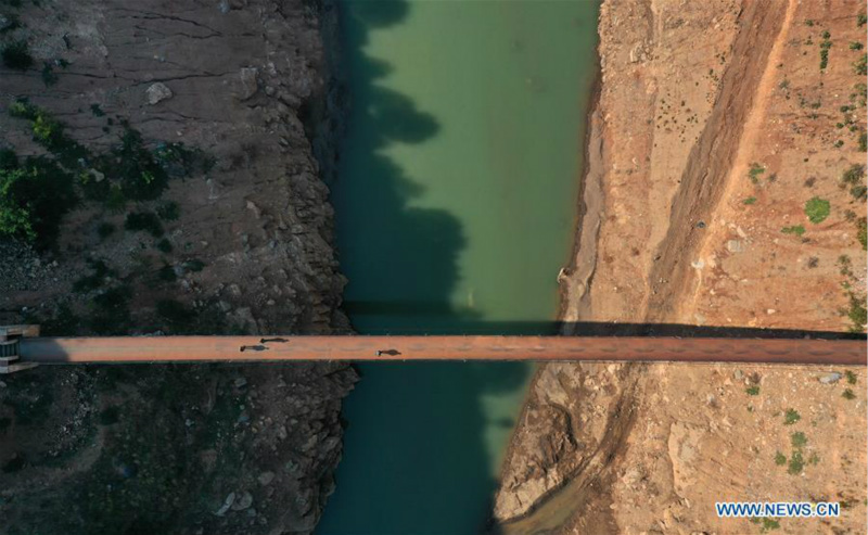 Le téléphérique remplacé par un pont le long de la rivière Niulan