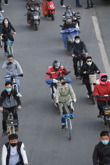 Les navetteurs de Beijing se mettent au vélo