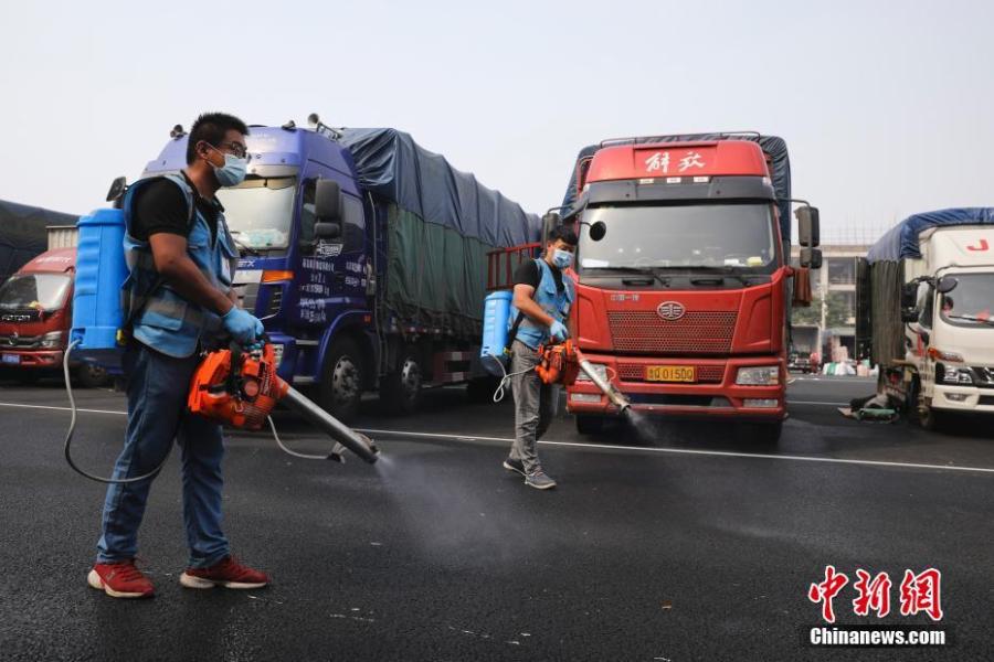 Le marché de gros de Beijing affecté par le virus est prêt pour une reprise complète