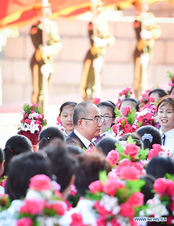 La Chine organise une réunion pour saluer les modèles dans la lutte contre le COVID-19