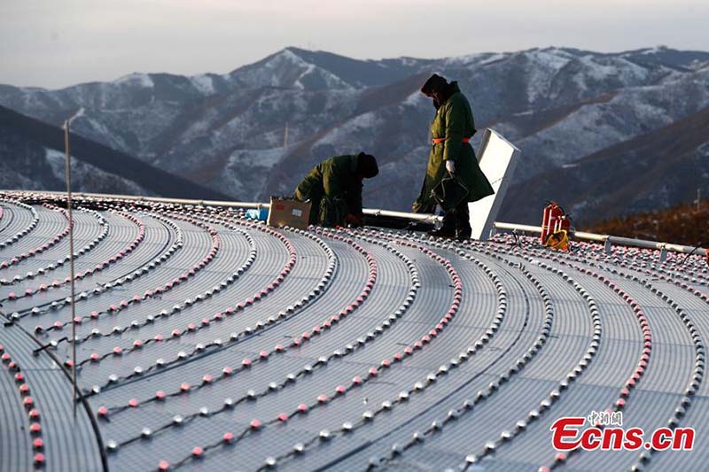 Le centre national de saut à ski des JO d'hiver de Beijing accélère les travaux de construction