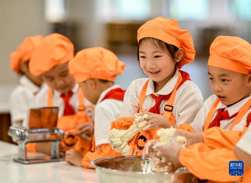 Chongqing : un cours ? épicé et délicieux ? de petites nouilles pour les enfants