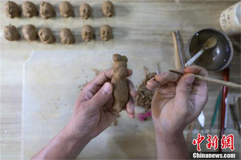 à la découverte de la technique de fabrication de sifflets de terre cuite de Tongzi dans le Guizhou