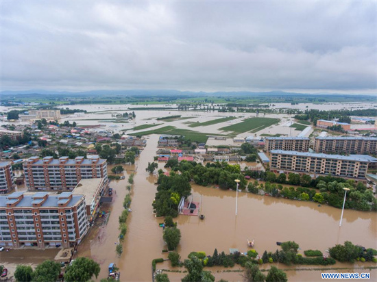 Photo aérienne prise le 5 ao?t 2023 des zones inondées à Yanshou, district de la ville de Harbin, capitale de la province chinoise du Heilongjiang (nord-est). (Photo : Gu Jingkun)