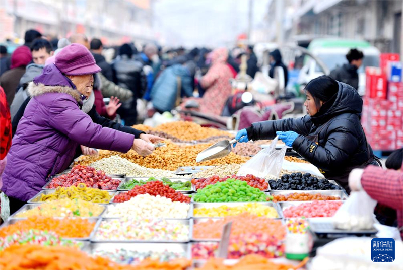 Les Chinois font leurs emplettes pour la fête du Printemps