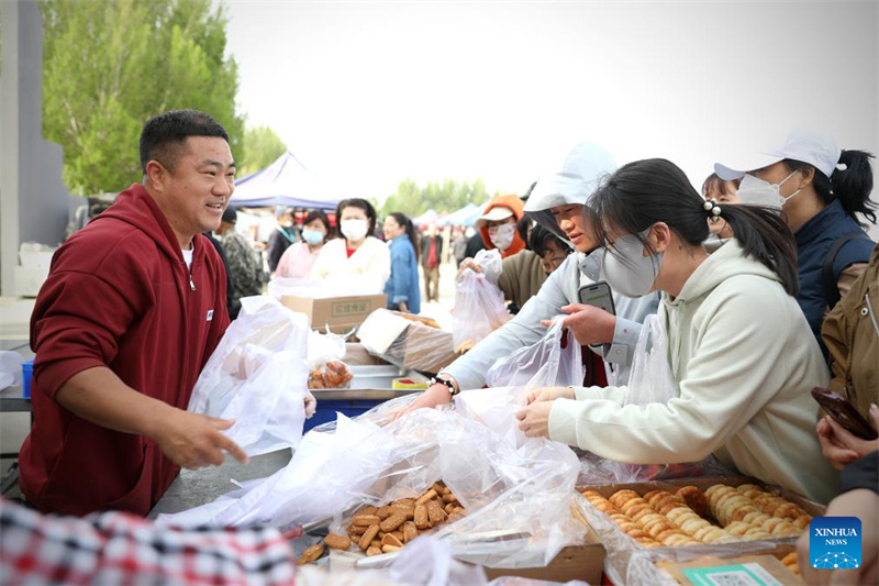 Liaoning : histoire en photos de la vie quotidienne d'un vendeur de biscuits de Yingkou