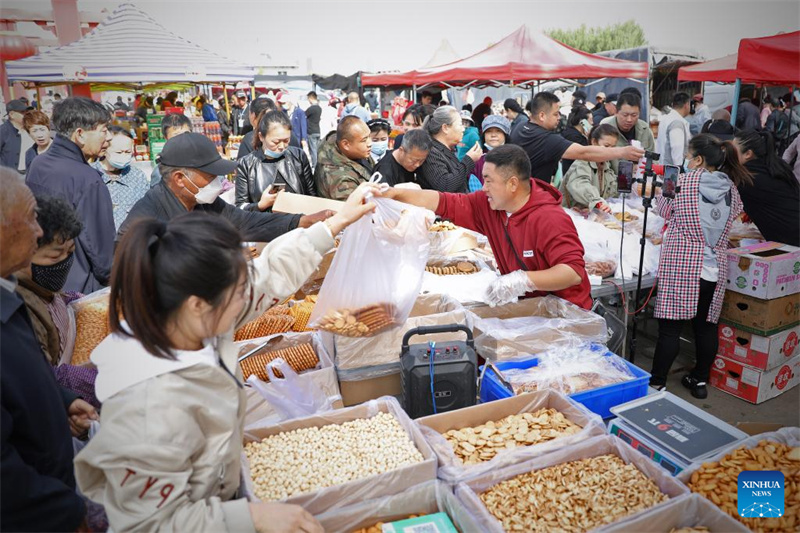 Liaoning : histoire en photos de la vie quotidienne d'un vendeur de biscuits de Yingkou