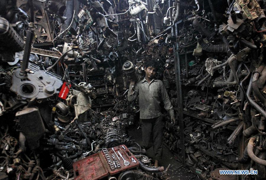 Photographe: Danish Siddiqui. Les résultats du 9e concours international chinois de photos de presse ont été dévoilés lors de la conférence de presse tenue à Hangzhou, chef-lieu de la province du Zhejiang (sud-est), le 25 mars 2013.